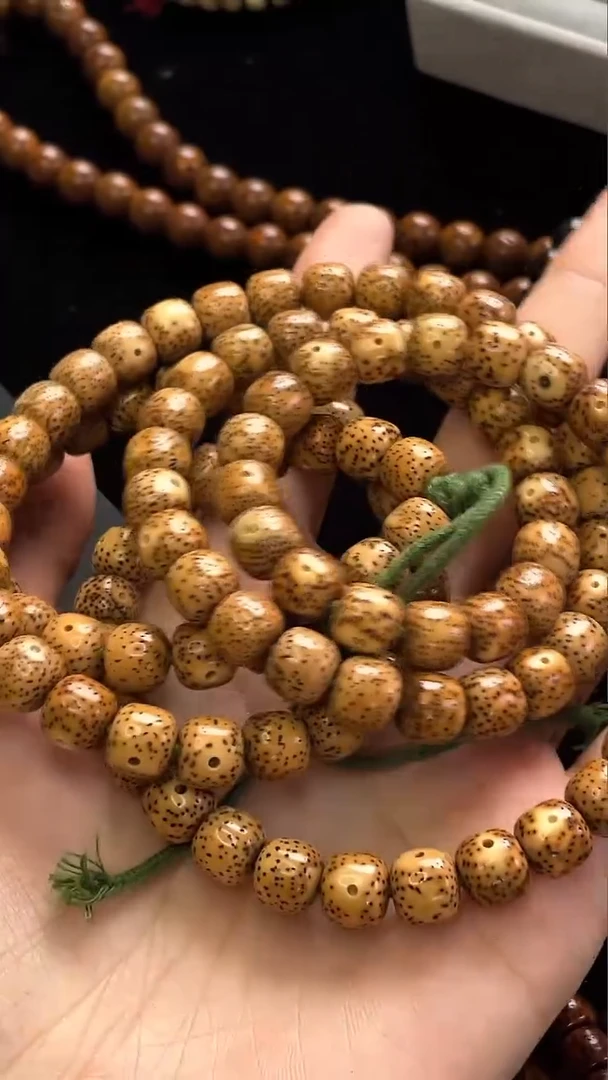 吊坠星月菩提精工级粉皮陈籽桶珠9*8长串（B）