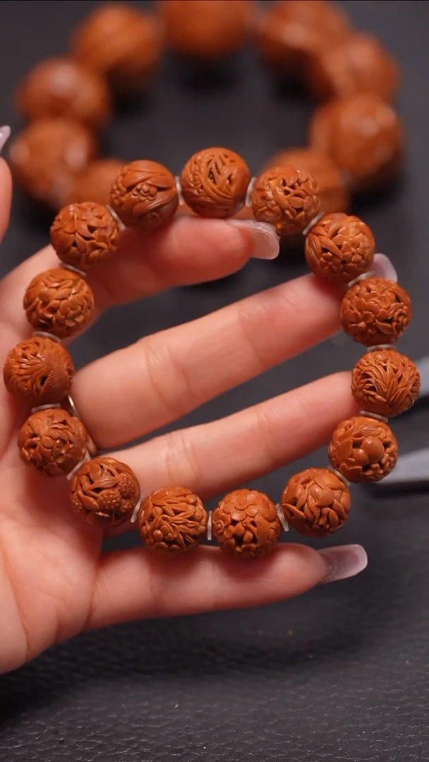 手串橄榄核1.5/正圆全镂空鸟语花钱