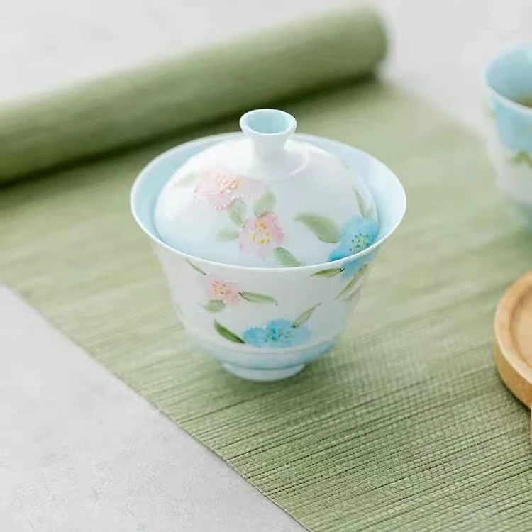 玉泥釉下彩花溪映月盖碗