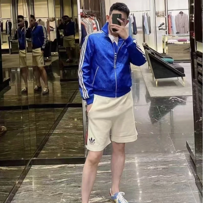 99新 GUCCI/古驰 X10868 Adidas联名 蓝色花满印夹克外套 50 L码