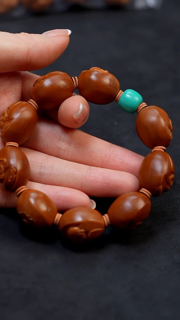 【闪购商品】橄榄核手串浮雕弥勒