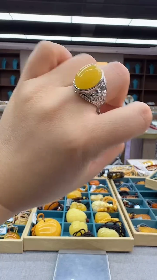 未镶嵌琥珀戒指158秒拍号 假一罚三