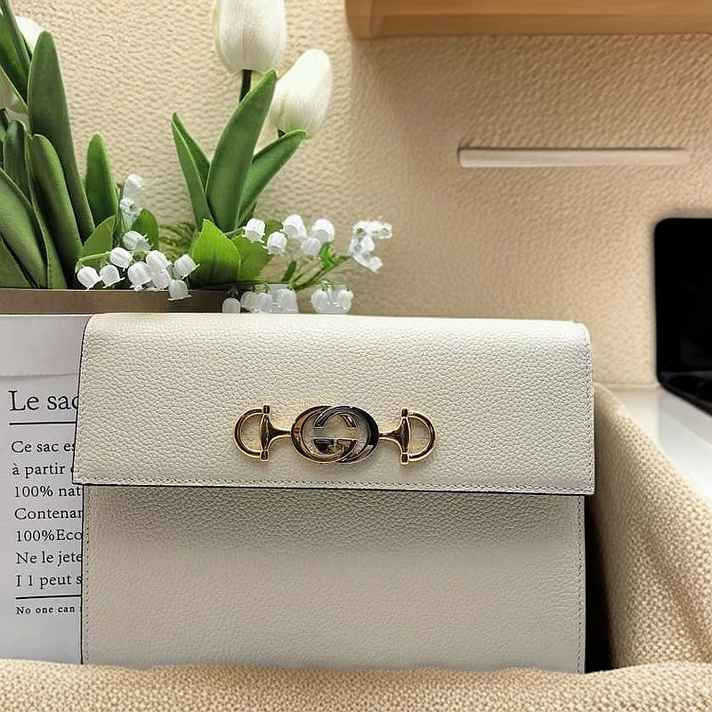 99新 GUCCI/古驰 手拿包1208 7214