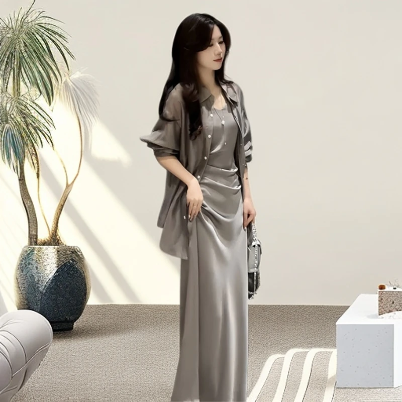 今年流行夏季两件套别致漂亮吊带连衣裙子高级感防晒外搭衬衫套装