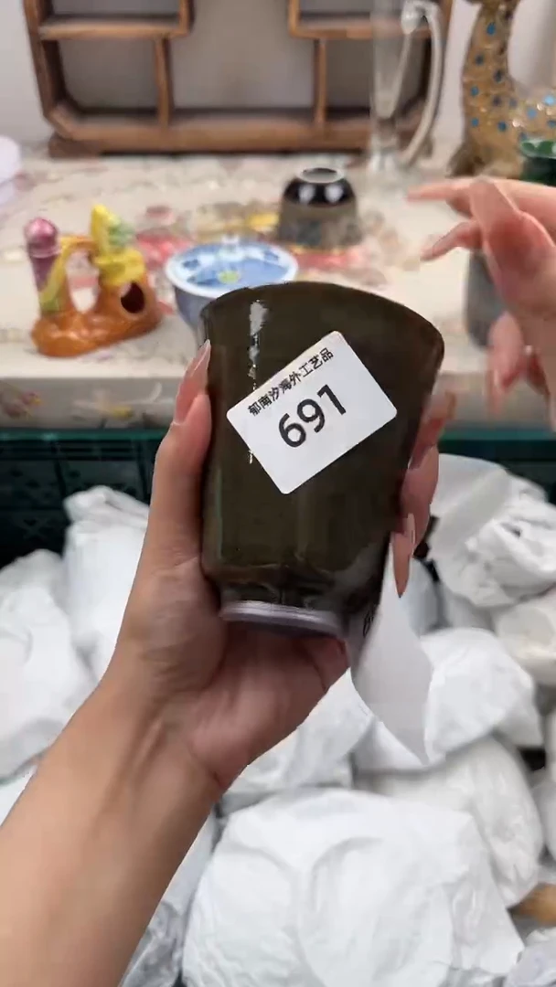 瓷片如**闻A         691