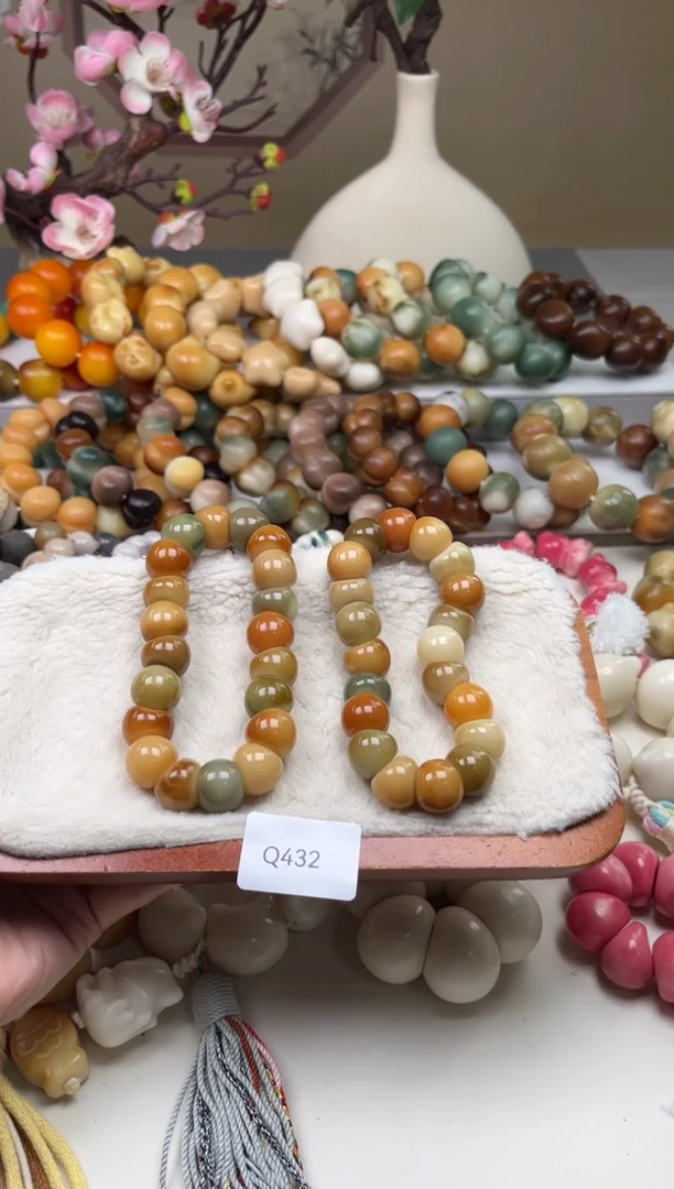 菩提根/象牙果吊坠瑕WQ432蒜瓣大肠14mm一串随机