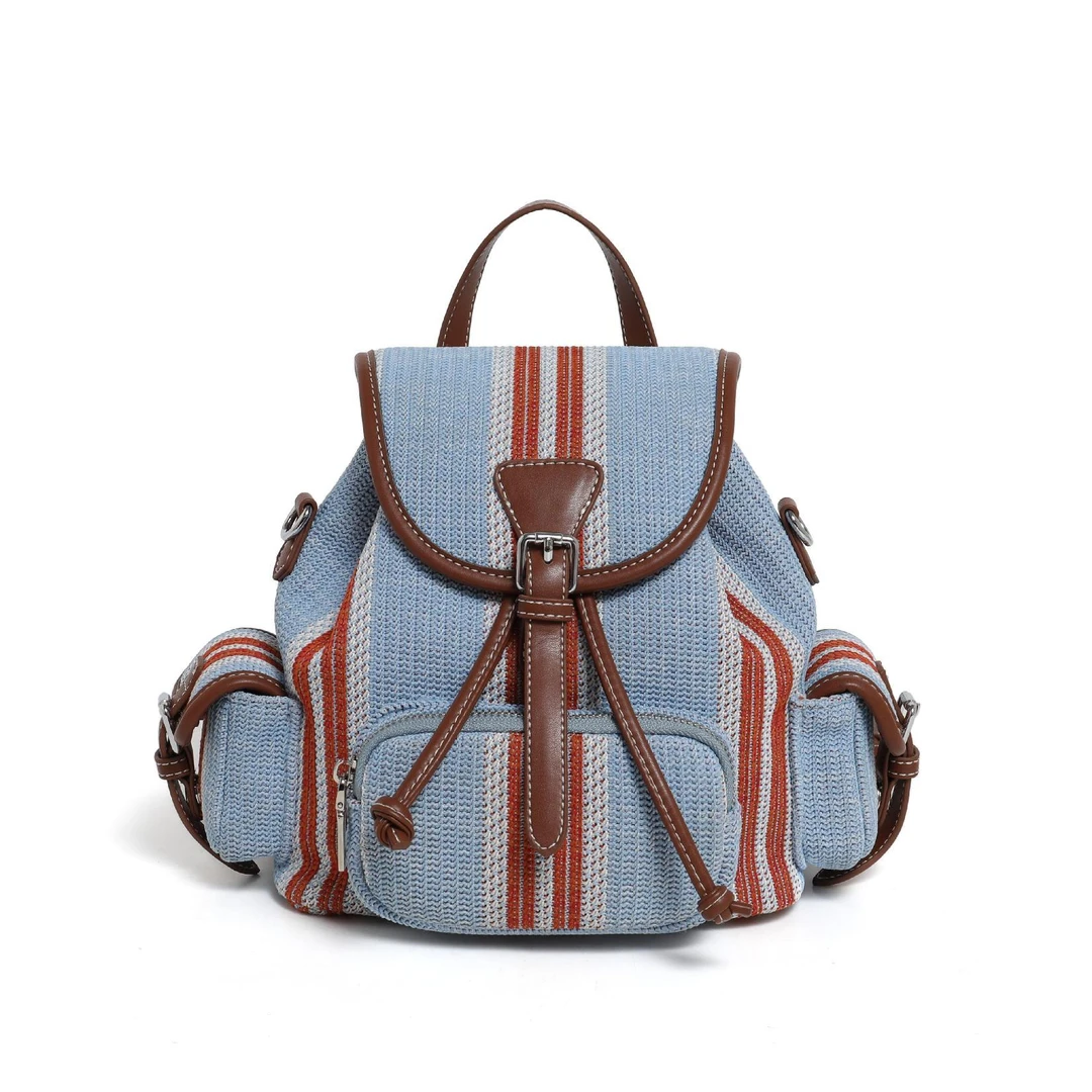 时尚百搭洋气休闲女士拼皮撞色包盖牛皮蓝色复古学生拼色双肩包