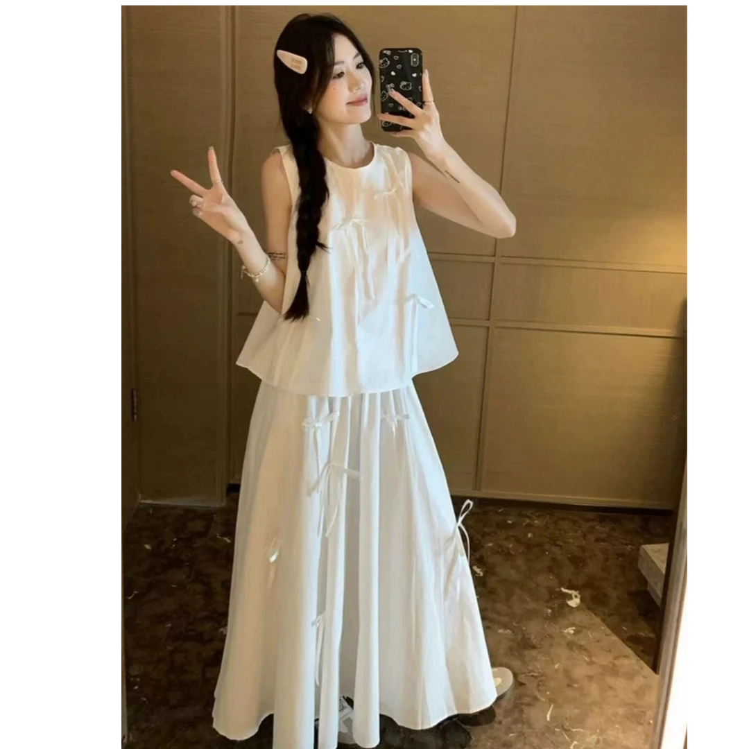XHM白色裙子搭配的上衣甜美风女夏季设计感蝴蝶结宽松无袖套装