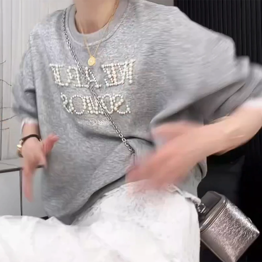 春夏季新款长袖蕾丝边拼接假两件字母珍珠刺绣百搭卫衣上衣女