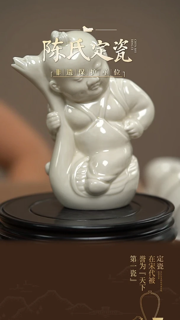 陈氏定窑童子抱鹅壶摆件