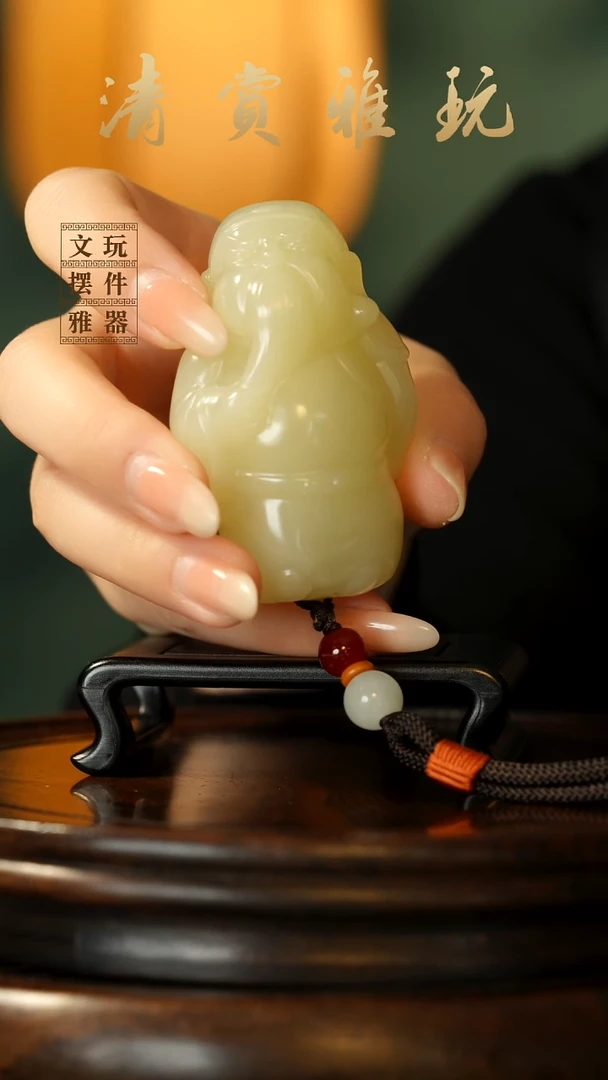 玉《义薄云天》手把件摆件