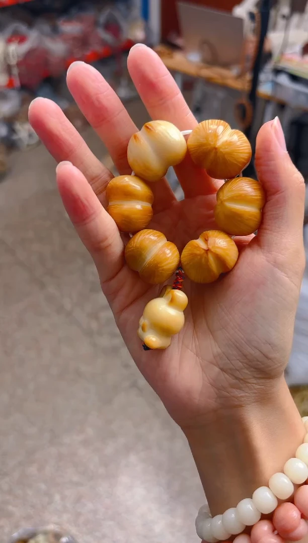 吊坠菩提根/象牙果黄色屁桃手捻  横款