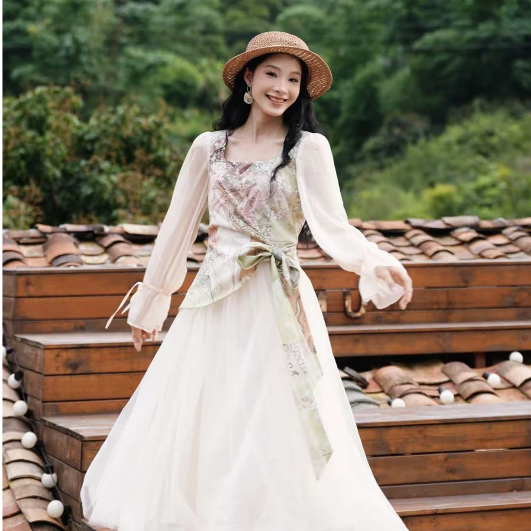 两三事夏野讴歌2025穆夏系列秋季新款小清新印花拼接假两件连衣裙