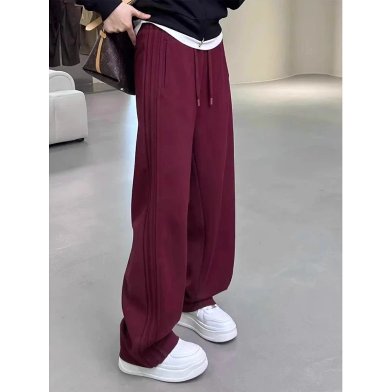 特大码300斤情侣安哥拉红镰刀卫裤男女冬季加绒加厚直筒香蕉裤ins