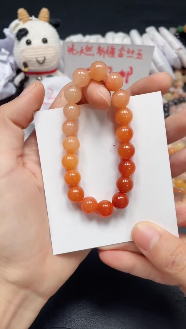 【闪购商品】石英质玉手链未镶嵌柿子红卡10