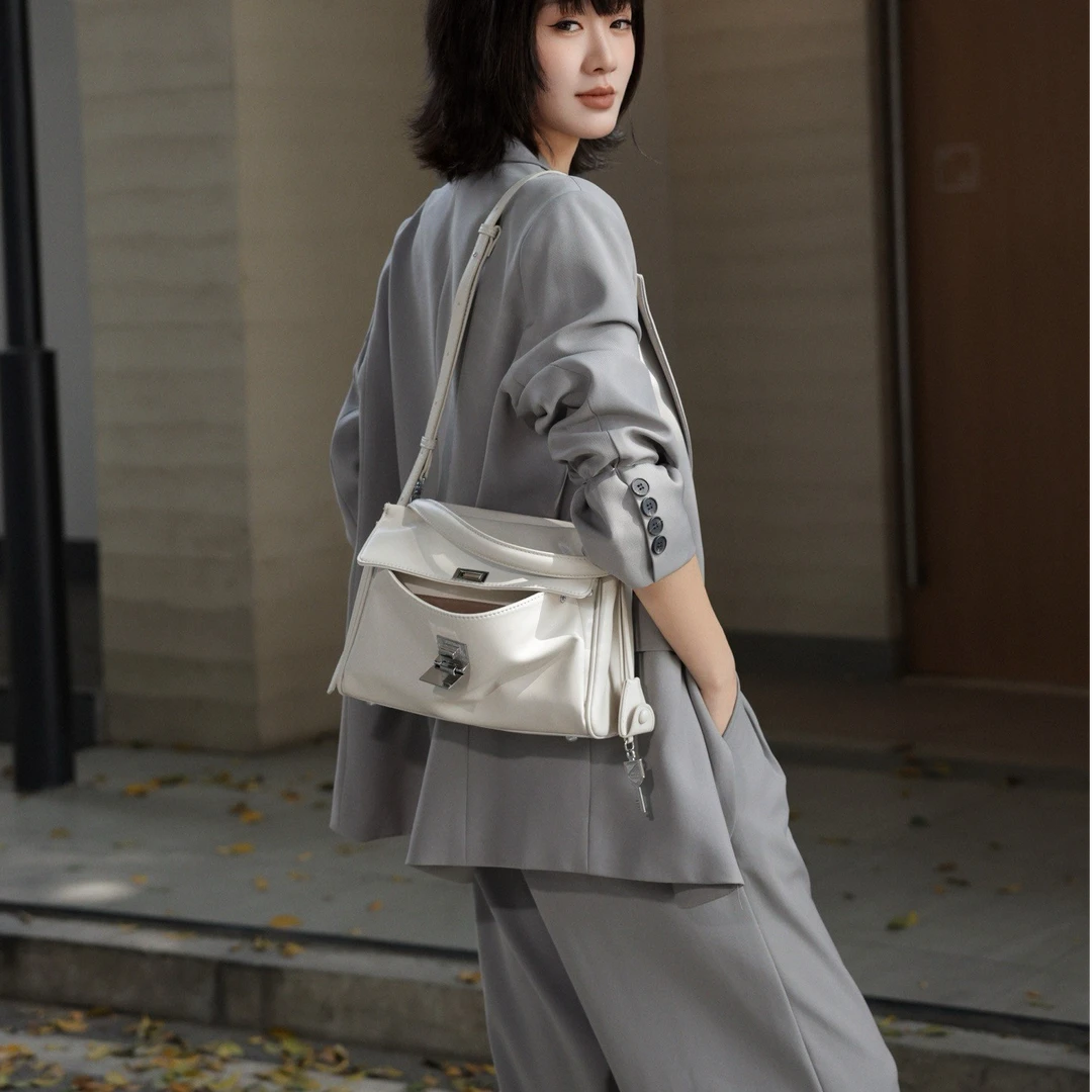 2025春夏新款腋下潮流复古手提单肩斜跨包时尚包 E101-E150