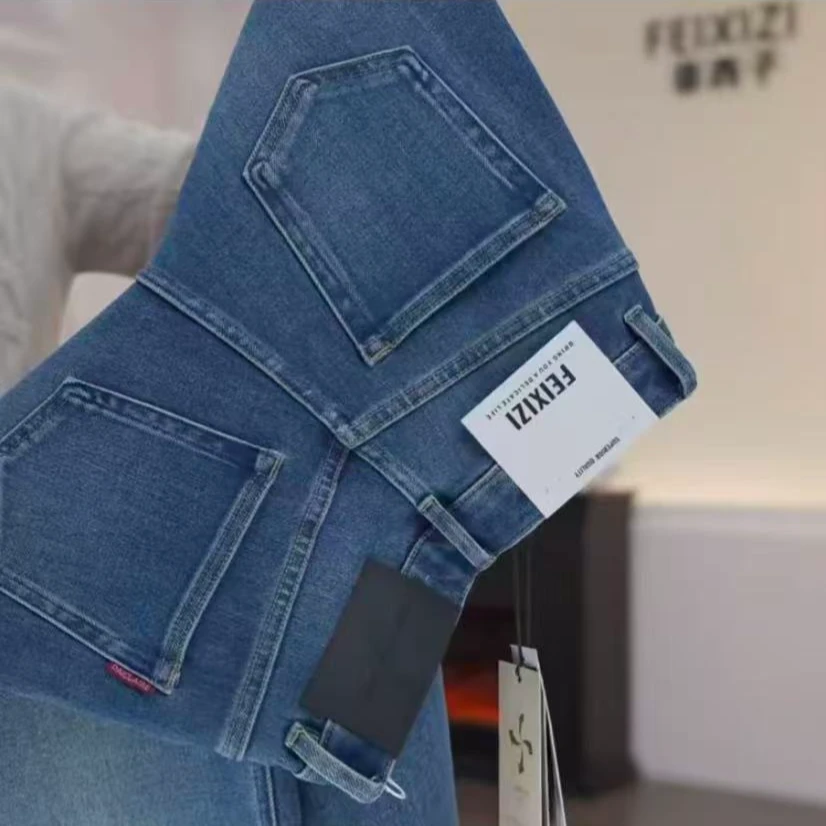 菲西子F95866菲西子牛仔裤女冬中腰显瘦蓝色百搭水洗阔腿牛仔裤