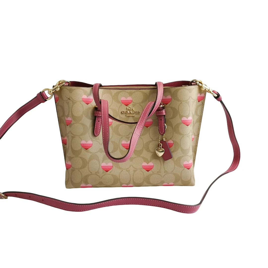 95新 COACH/蔻驰 Coach 老花粉水桶包  022055