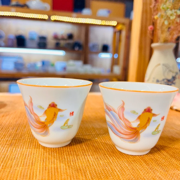 鱼影青杯子羊脂玉瓷茶杯家用创意客杯
