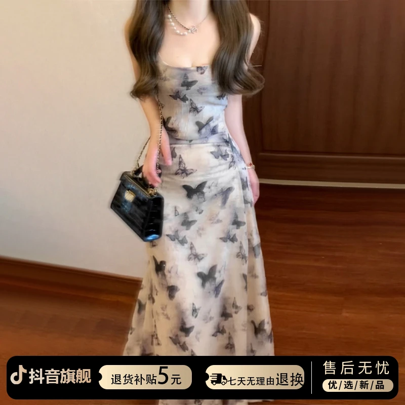 法式黑色蝴蝶印花吊带连衣裙子女装2025新款夏季褶皱收腰显瘦长裙