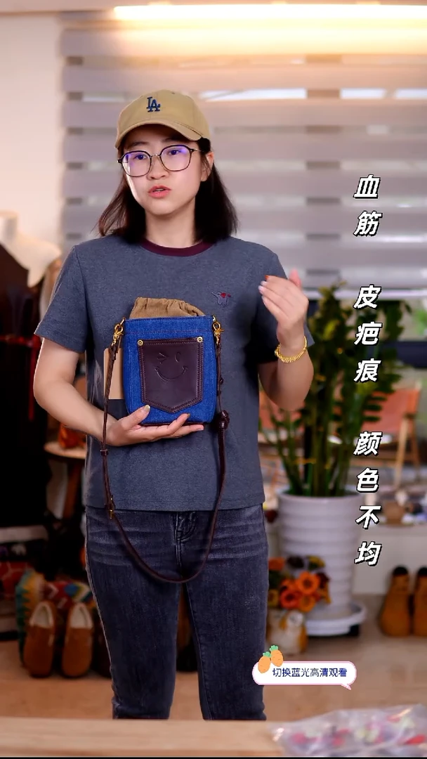 牛皮不退换！深蓝色手机包