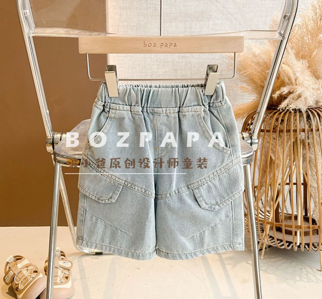 侧口袋水洗牛仔中裤