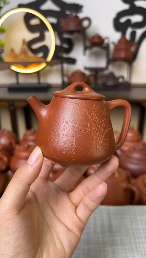 茶壶段泥红降坡高石瓢壶兰花刻150CC-甘来兵