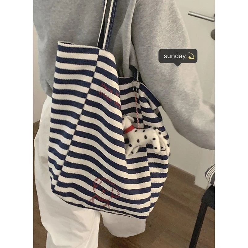 学院风大容量帆布包包女款2025新款春季时尚单肩包百搭通勤托特包