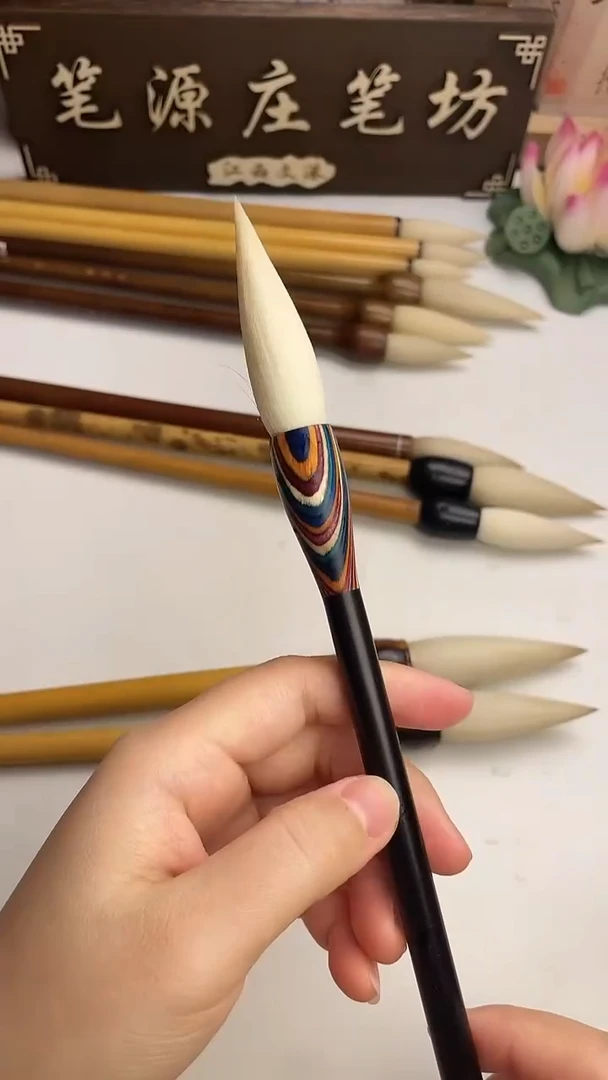 出峰5.5口径1.3纯羊毫黑檀木杆1支