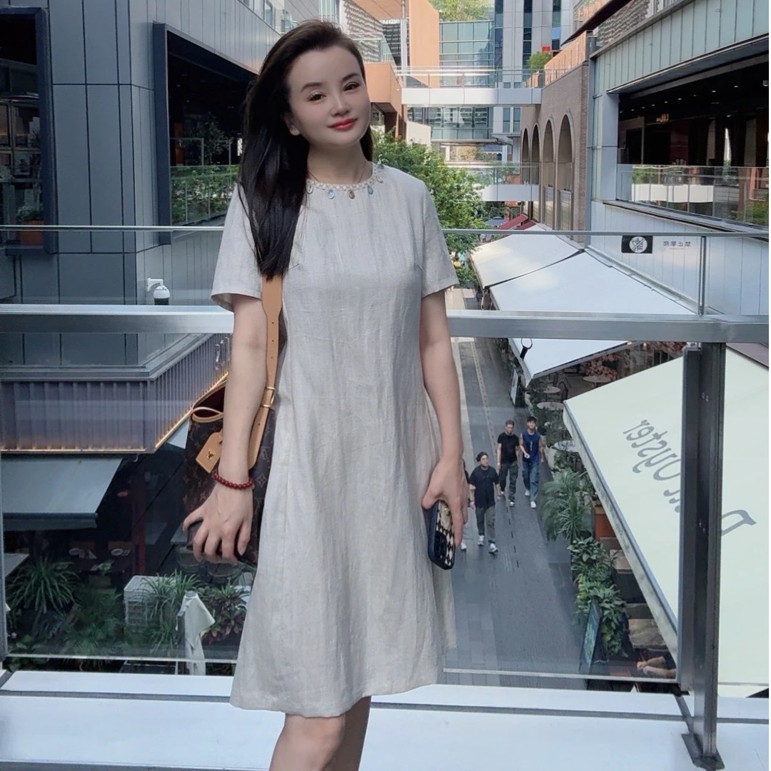 Crue Jiien 初婕夏季新款波西米亚宽松A字摆轻薄亚麻连衣裙98662