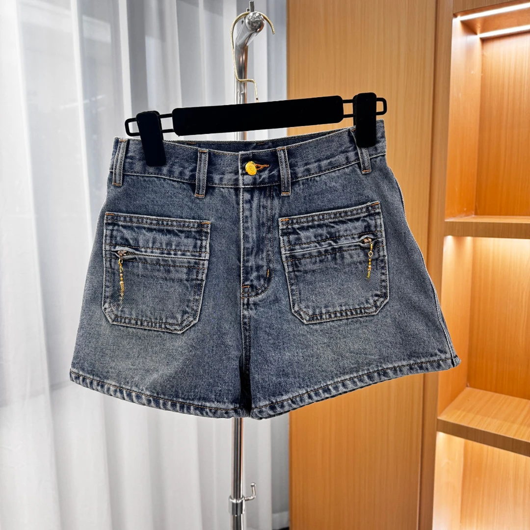 《猪猪出品》2025上新夏季时尚蓝色牛仔短裤小链子休闲百搭潮流599