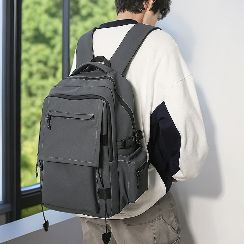 防水书包男大学生简约大容量双肩包女初中生高中生休闲旅行背包女