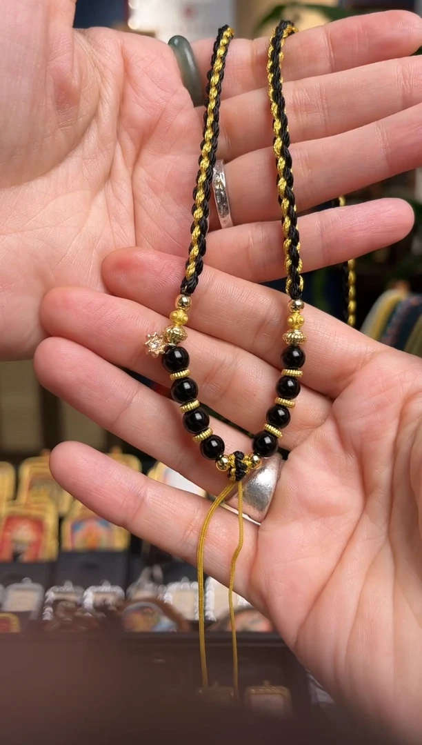 吊坠手编绳子黑金猫眼