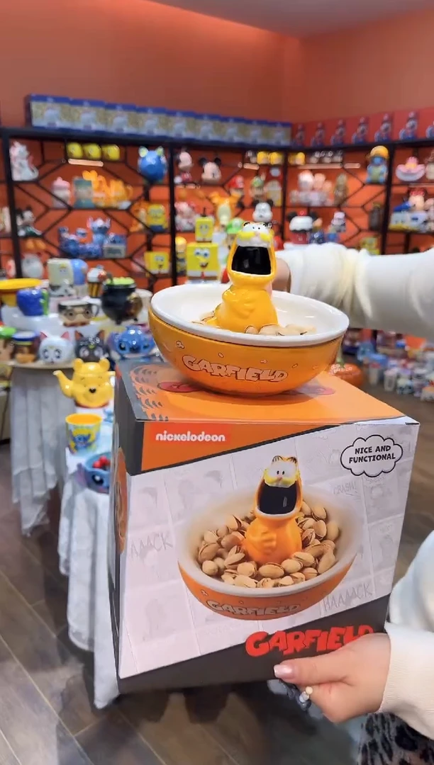 瓷片@@加菲猫陶瓷瓜子盘