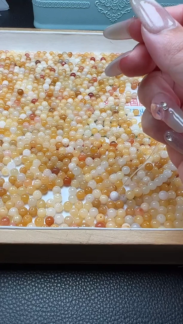 未镶嵌石英质玉（黄龙玉）散珠杨*单：1