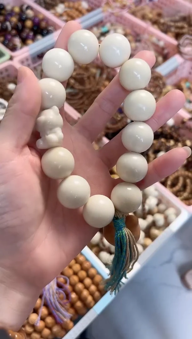 菩提根/象牙果手串象牙果圆珠搭配机器猫手持
