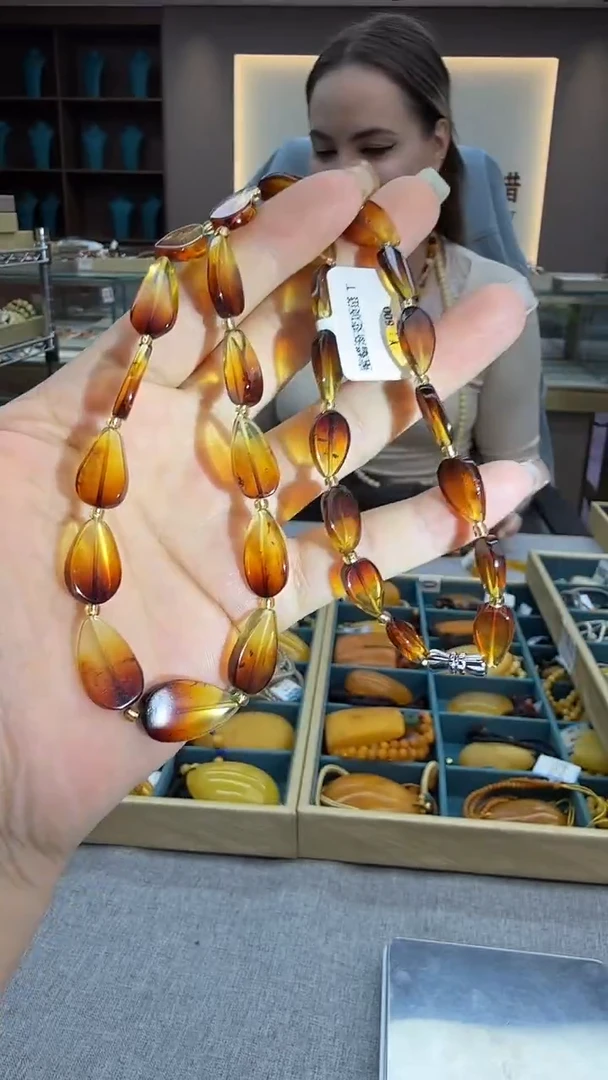 琥珀颈饰未镶嵌38秒拍号 假一罚三