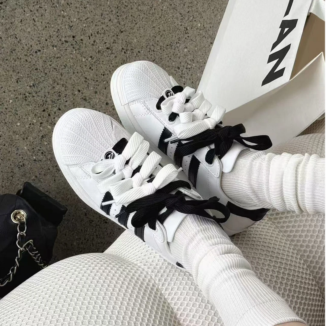 诗歌兰女鞋2025年新款真皮厚底德训鞋韩版休闲运动板鞋0506-3