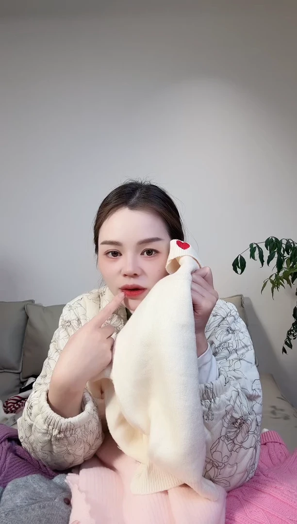 菩**台爱心毛衣150 一件