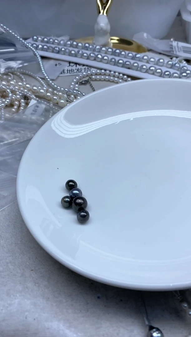 裸珠海水珍珠花?通孔5颗
