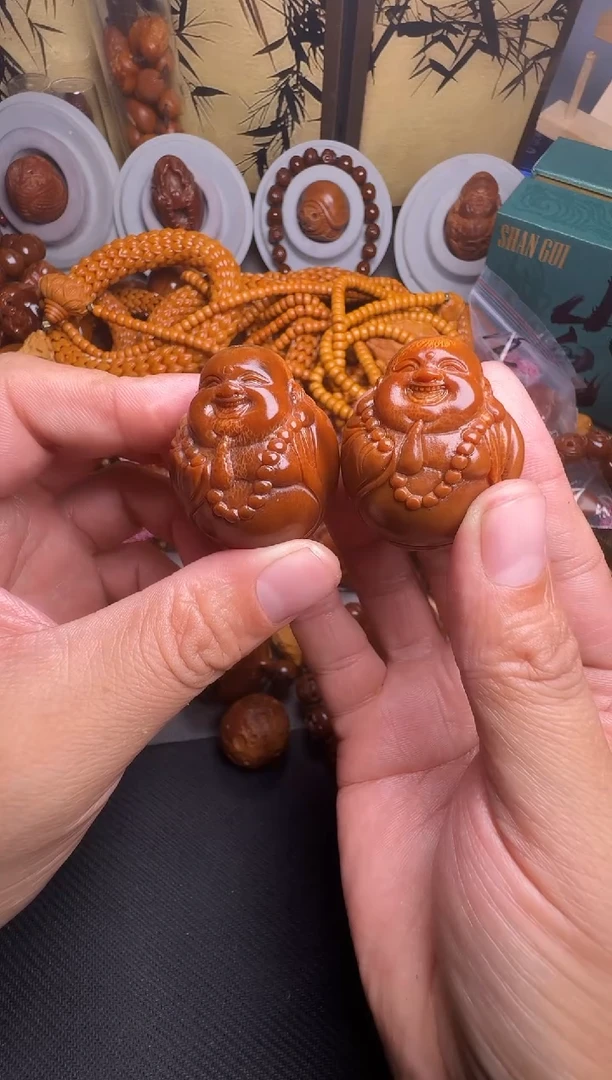 手串橄榄核?**花弥勒一对