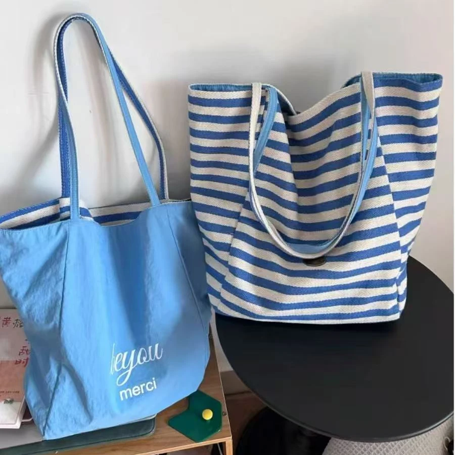 夏日元气条纹帆布包包女式2025新款双面单肩托特包韩系手提购物袋