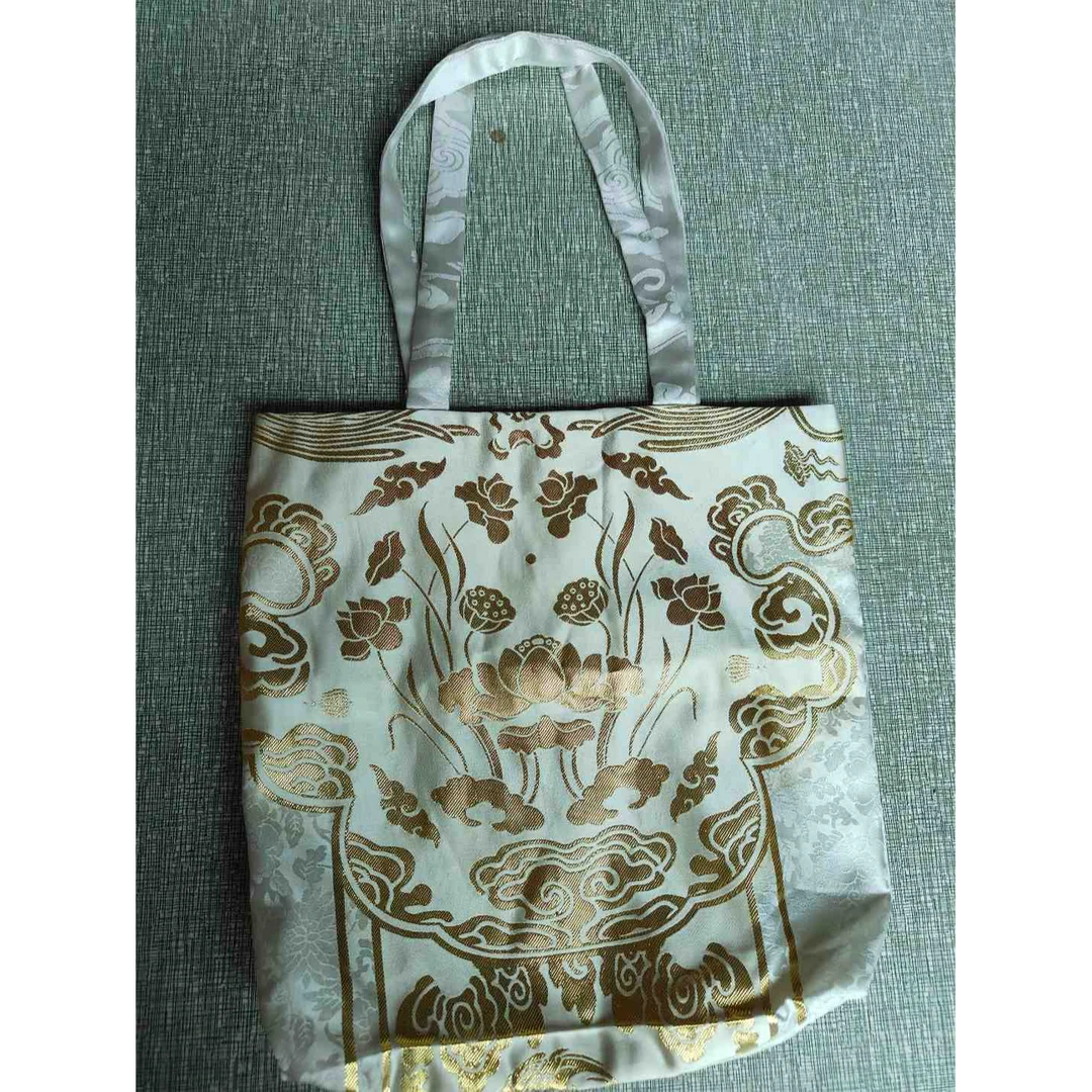 子衣明堂福利妆花手提袋