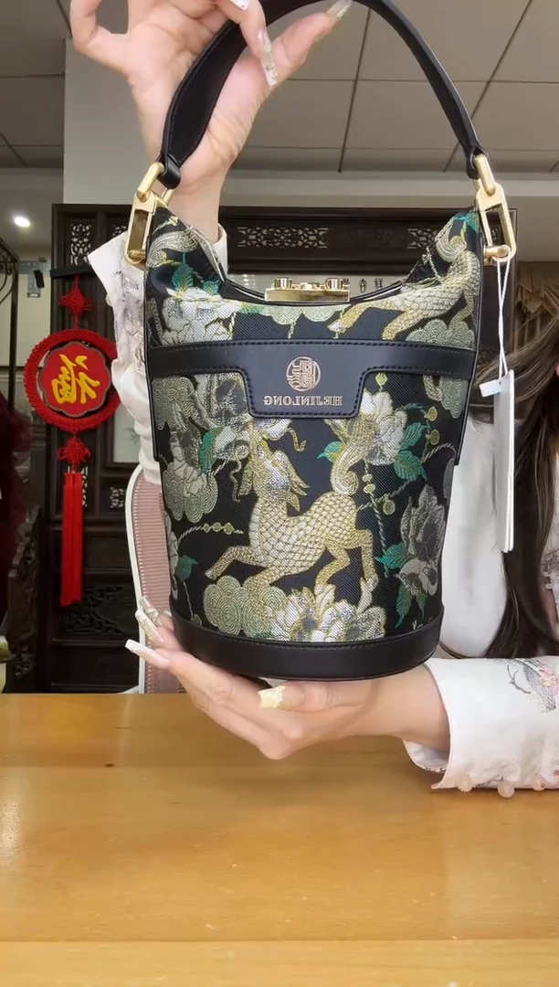 织物默*言黑色桶包