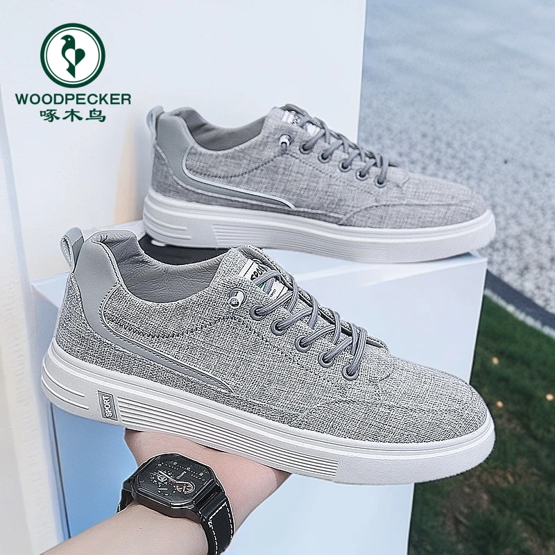【正品】啄木鸟男鞋运动休闲布鞋男款工作上班帆布男士亚麻平底板鞋