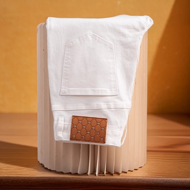 维斯克纳时尚新款春夏白色男士牛仔裤时尚修身小直筒复古九分男裤