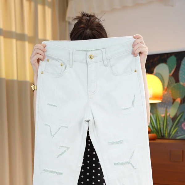 破洞男士牛仔裤夏季新款欧版时尚个性潮百搭白色修身小脚男装长裤