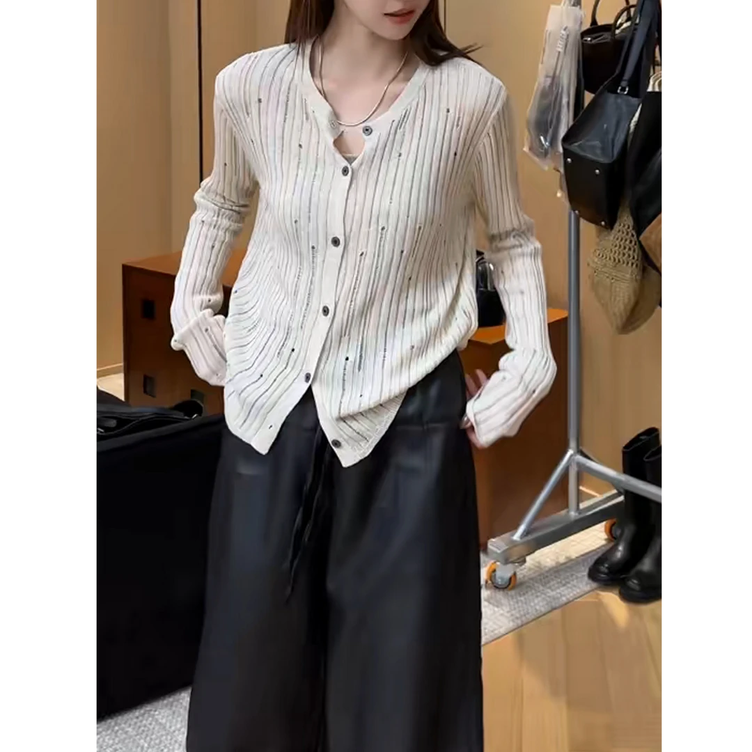 浅卡其圆领镂空长袖针织开衫女2025年早秋新款款韩系百搭减龄上衣