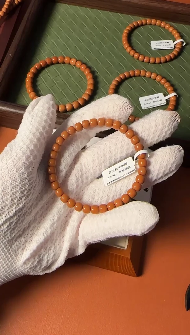 手串橄榄核【168核尖】6.5mm老挝核尖老型单圈 三花面无白树王老料