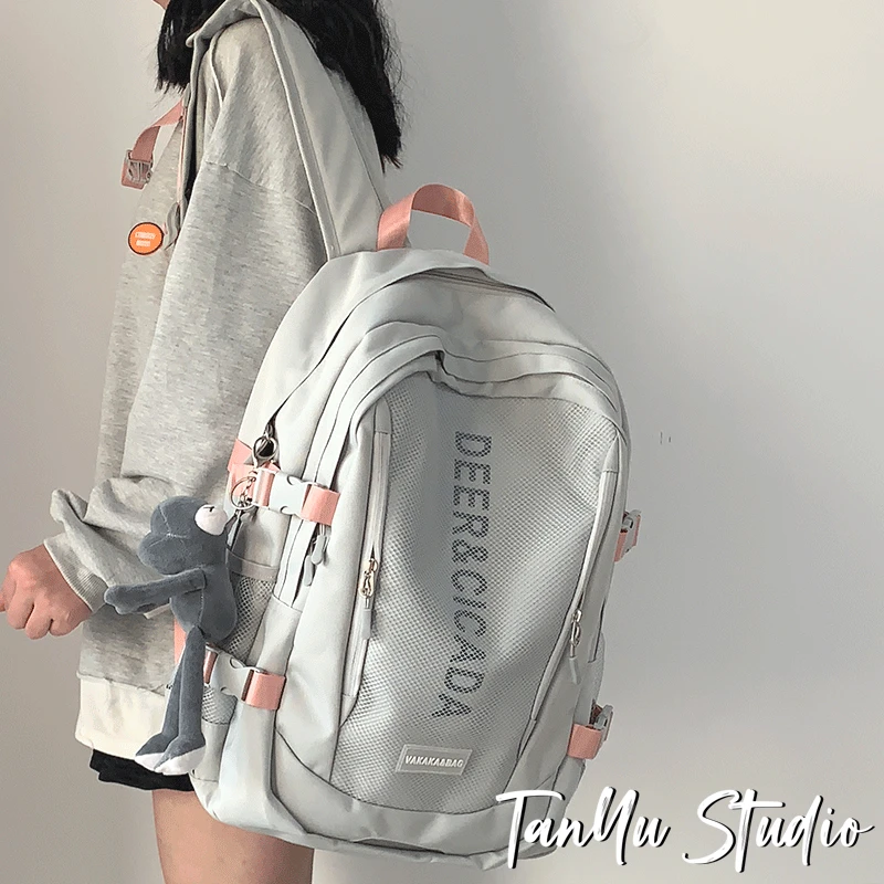 探屿潮牌书包女大学生简约休闲旅行男士日系初高中大容量双肩背包